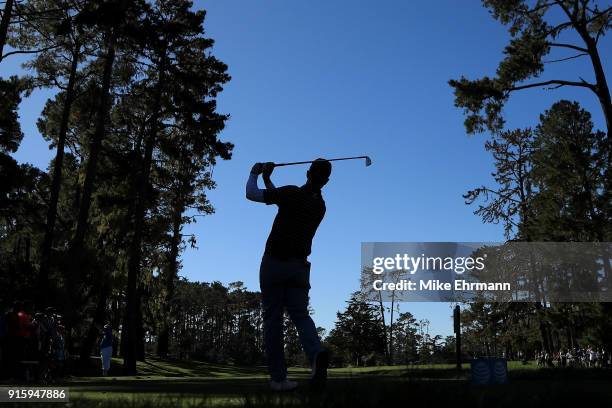 Kevin Streelman plays his shot from the 17th tee during Round One of the AT&T Pebble Beach Pro-Am at Spyglass Hill Golf Course on February 8, 2018 in...