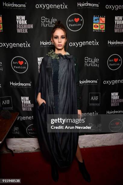 Model prepares backstage at New York Fashion Week Powered by Art Hearts Fashion NYFW at The Angel Orensanz Foundation on February 8, 2018 in New York...