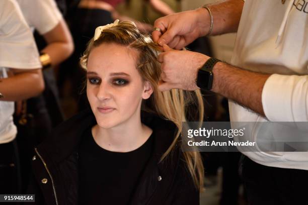 Model prepares backstage at New York Fashion Week Powered by Art Hearts Fashion NYFW at The Angel Orensanz Foundation on February 8, 2018 in New York...