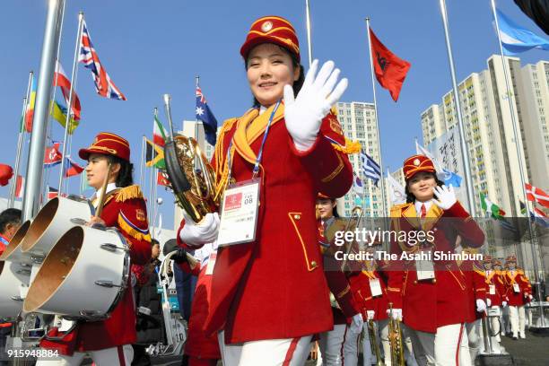 Members of the Democratic People's Republic of Korea band look on during their welcome ceremony ahead of the PyeongChanag Winter Olympic Games at the...