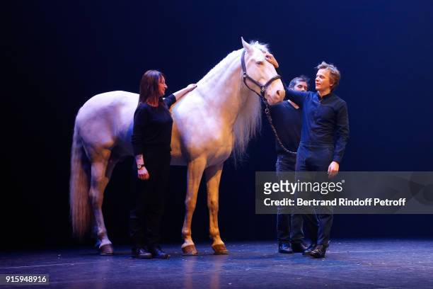 Alex Lutz with Yann Vaille and Veronique who take care of the horse on stage during the Alex Lutz One Man Show At L'Olympia on February 8, 2018 in...