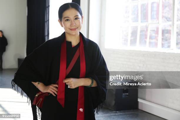 Designer Lan Yu poses backstage for Lanyu during New York Fashion Week: The Shows at Industria Studios on February 8, 2018 in New York City.