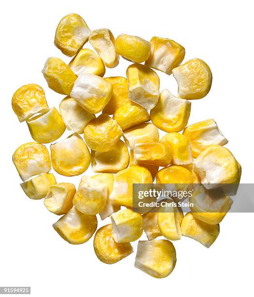pile of yellow corn kernels - corn syrup stock pictures, royalty-free photos & images