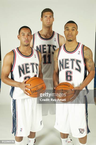 Devin Harris, Brook Lopez and Courtney Lee of the New Jersey Nets pose for a portrait during 2009 NBA Media Day on September 28, 2009 at the Nets...