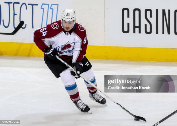Nail Yakupov of the Colorado Avalanche plays the puck up the ice during second period action against the Winnipeg Jets at the Bell MTS Place on...