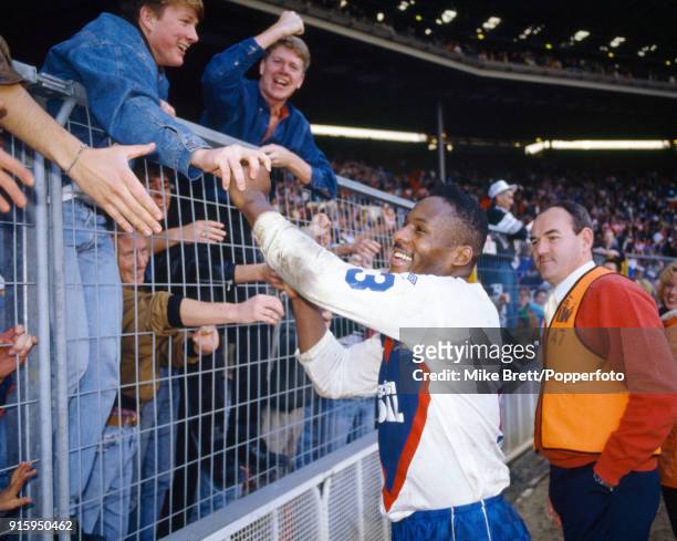 Great Britain captain Ellery Hanley is congratulated by fans following their International rugby league victory over Australia at Wembley Stadium in...