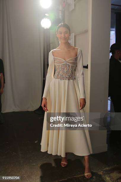 Model poses backstage for Lanyu during New York Fashion Week: The Shows at Industria Studios on February 8, 2018 in New York City.