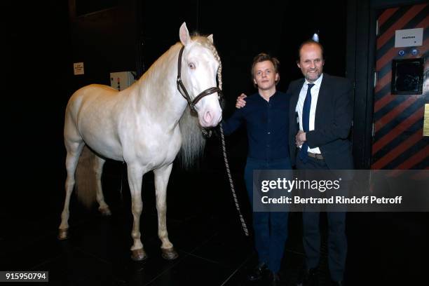 Alex Lutz, the Horse of the show and Producer of the show Jean-Marc Dumontet pose after the Alex Lutz One Man Show At L'Olympia on February 8, 2018...