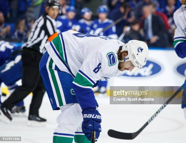 Christopher Tanev of the Vancouver Canucks reacts to giving up a goal to the Tampa Bay Lightning during the first period at Amalie Arena on February...