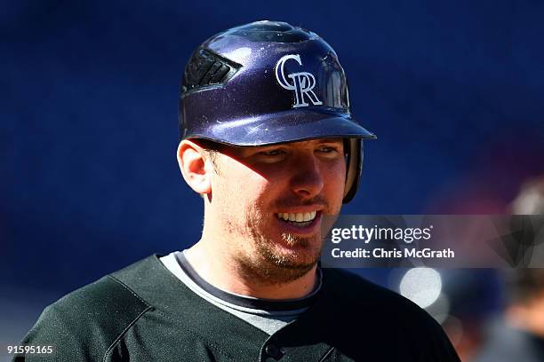 Garrett Atkins of the Colorado Rockies looks on during batting practice prior to Game Two of the NLDS against the Philadelphia Phillies during the...