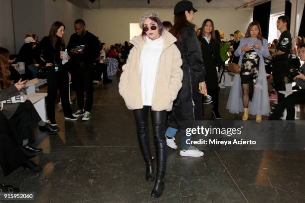 Guest attends the Lanyu front row during New York Fashion Week: The Shows at Industria Studios on February 8, 2018 in New York City.