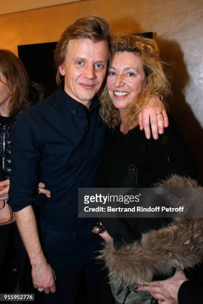 Alex Lutz and Stephanie Murat pose after the Alex Lutz One Man Show At L'Olympia on February 8, 2018 in Paris, France.