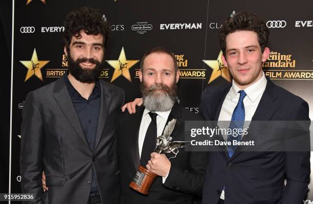 Alec Secareanu, Francis Lee and Josh O'Connor pose with the Breakthrough of the Year award for "God's Own Country at the London Evening Standard...