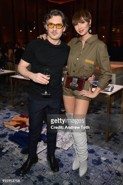Stuart Weitzman Creative Director Giovanni Morelli and Jackie Cruz attend the Stuart Weitzman FW18 Presentation and Cocktail Party at The Pool on...