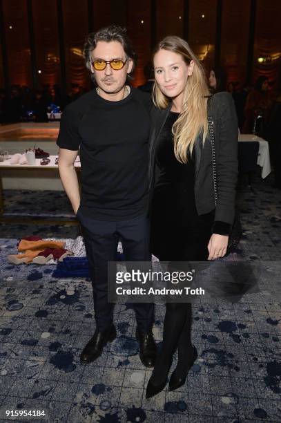Stuart Weitzman Creative Director Giovanni Morelli and Dylan Penn attend the Stuart Weitzman FW18 Presentation and Cocktail Party at The Pool on...