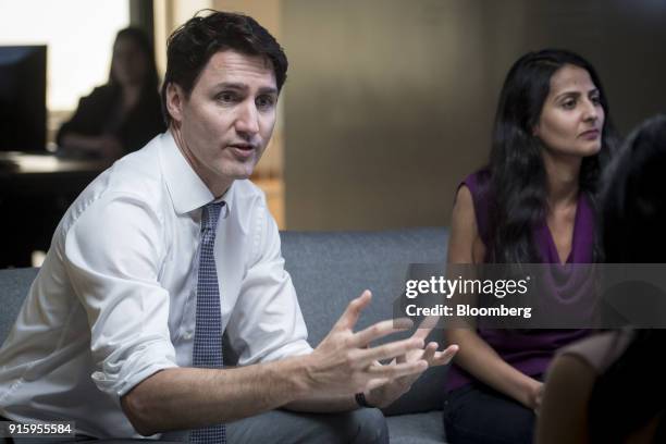 Justin Trudeau, Canada's prime minister, left, meets with employees of AppDirect Inc., in San Francisco, California, U.S., on Thursday, Feb. 8, 2018....