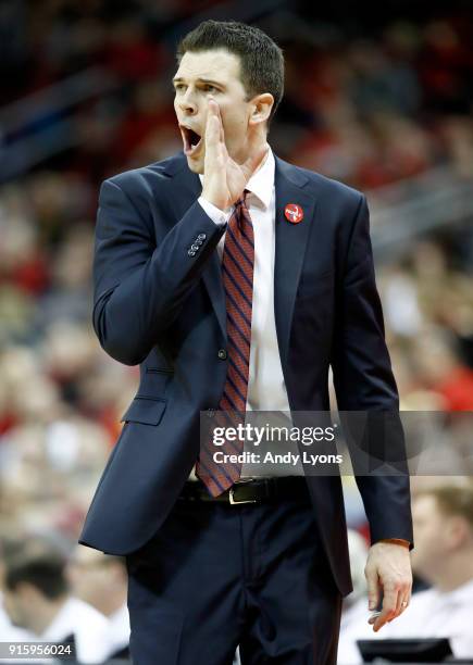 David Padgett the interim head coach of the Louisville Cardinals gives instructions to his team against the Georgia Tech Yellow Jackets during the...