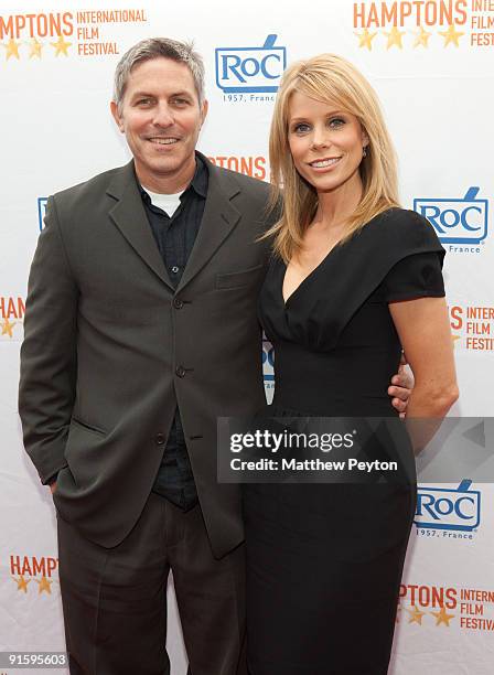 Producer Andy Ostroy and Director Cheryl Hines arrive at the 17th annual Hamptons International Film Festival premiere of "Serious Moonlight" at the...