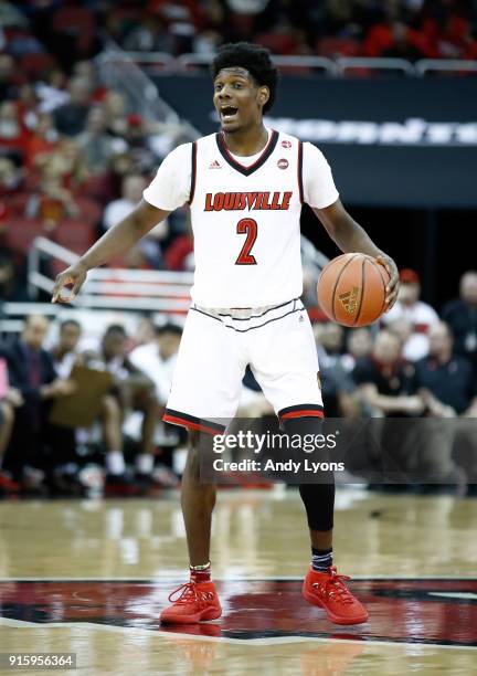 Darius Perry of the Louisville Cardinals dribbles the ball against the Georgia Tech Yellow Jackets during the game at KFC YUM! Center on February 8,...