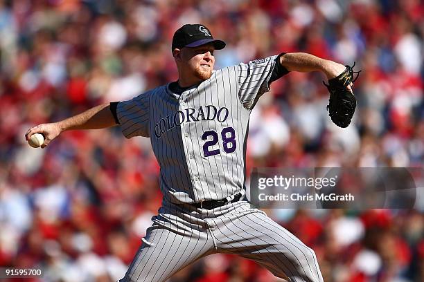 Starting pitcher Aaron Cook of the Colorado Rockies throws a pitch against the Philadelphia Phillies in Game Two of the NLDS during the 2009 MLB...