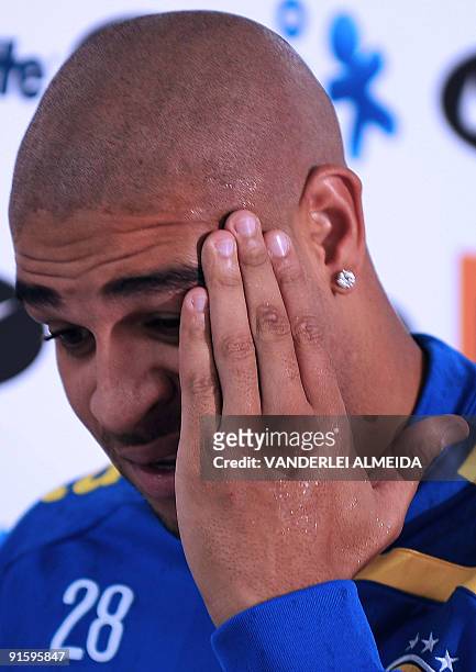 Brazilian national football team player Adriano gestures during a press conference before a training session October 8 in Teresopolis, Brazil. Brazil...