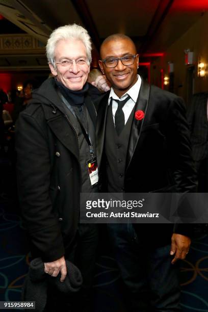 Ben Chasin and Comedian Tommy Davidson attend the American Heart Association's Go Red For Women Red Dress Collection 2018 presented by Macy's at...