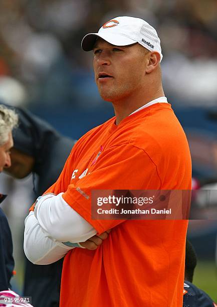 Injured linebacker Brian Urlacher of the Chicago Bears watches as his teammates take on the Detroit Lions on October 4, 2009 at Soldier Field in...