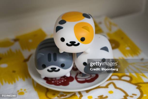 Hit-Point Co. Game app Neko-Atsume figures are arranged for a photograph at the company's office in Kyoto, Japan, on Monday, Jan. 29, 2018. The...