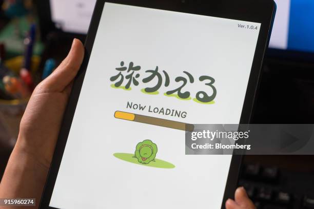 Hit-Point Co. Game app Tabi Kaeru, or Travel Frog, is arranged for a photograph on a tablet device in Kyoto, Japan, on Monday, Jan. 29, 2018. The...