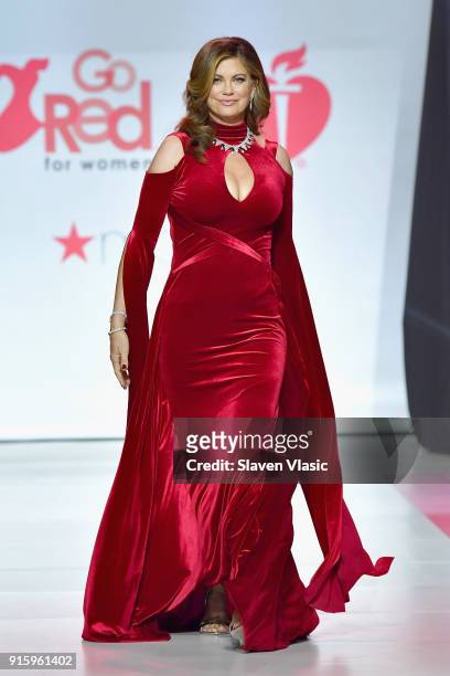 Kathy Ireland walks the runway during the American Heart Association's Go Red For Women Red Dress Collection 2018 presented by Macy's at Hammerstein...