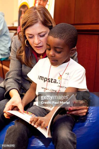 Rep. Loretta Sanchez reads to a child at Jump Start's "Read for the Record" at Capitol Hill on October 8, 2009 in Washington, DC.