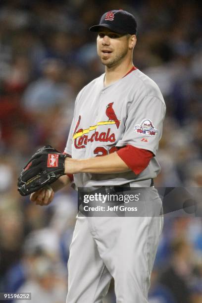 Pitcher Chris Carpenter of the St. Louis Cardinals reacts against the Los Angeles Dodgers in Game One of the NLDS during the 2009 MLB Playoffs at...