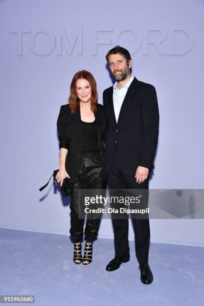 Julianne Moore and Bart Freundlich attend the Tom Ford Women's Fall/Winter 2018 fashion show during New York Fashion Week at Park Avenue Armory on...