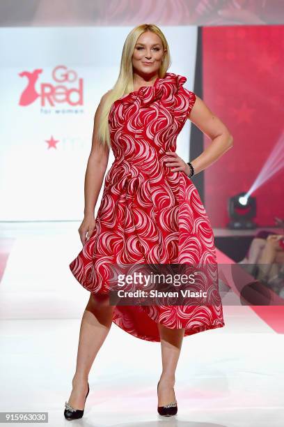 Actor Elisabeth Rohm pose onstage at the American Heart Association's Go Red For Women Red Dress Collection 2018 presented by Macy's at Hammerstein...