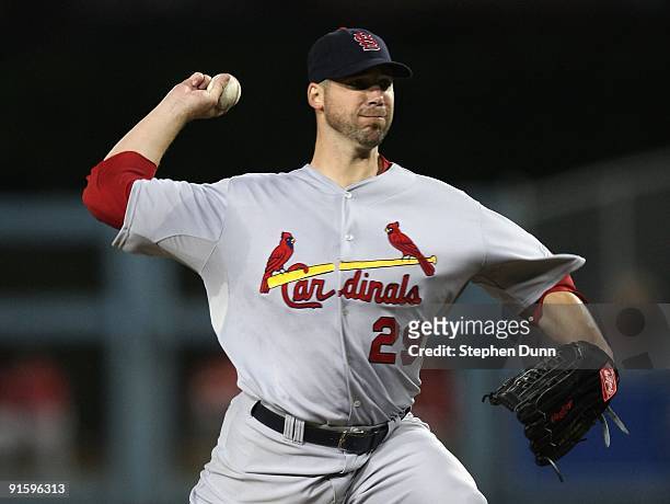 Pitcher Chris Carpenter of the St. Louis Cardinals pitches in the fourth inning against the Los Angeles Dodgers in Game One of the NLDS during the...
