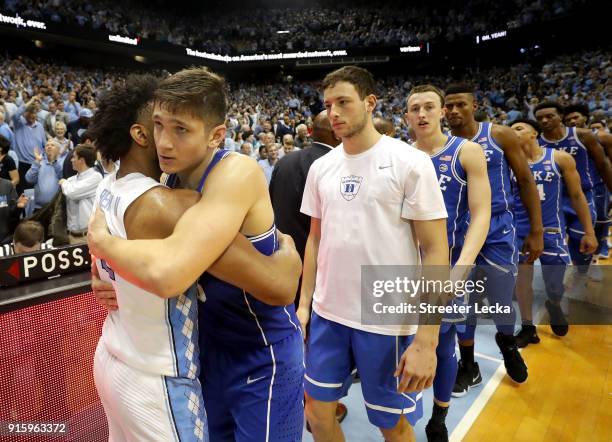 Joel Berry II of the North Carolina Tar Heels hugs Grayson Allen of the Duke Blue Devils after the Tar Heels defeated the Blue Devils 82-78 at Dean...