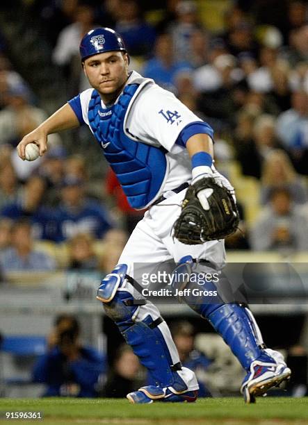 Russell Martin of the Los Angeles Dodgers throws the ball to first base against the St. Louis Cardinals in Game One of the NLDS during the 2009 MLB...