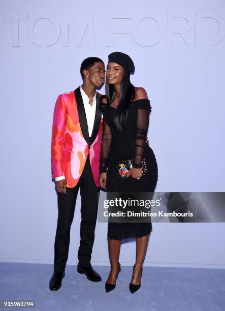 Christian Combs and Kim Porter attend the Tom Ford Fall/Winter 2018 Women's Runway Show at the Park Avenue Armory on February 8, 2018 in New York...