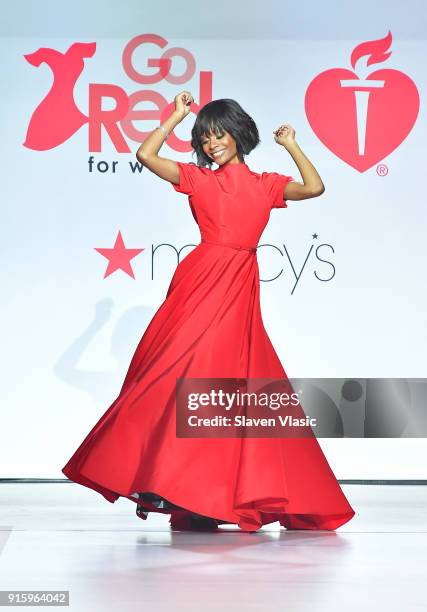 Personality Zuri Hall walks the runway during the American Heart Association's Go Red For Women Red Dress Collection 2018 presented by Macy's at...