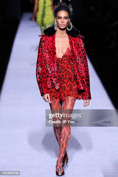 Model Joan Smalls walks the runway at the Tom Ford Womenswear FW18 Collection at Park Avenue Armory on February 8, 2018 in New York City.