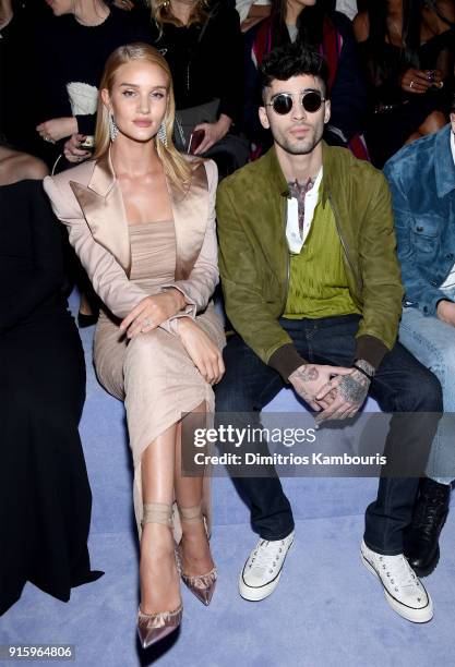 Rosie Huntington-Whiteley and Zayn Malik attend the Tom Ford Fall/Winter 2018 Women's Runway Show at the Park Avenue Armory on February 8, 2018 in...