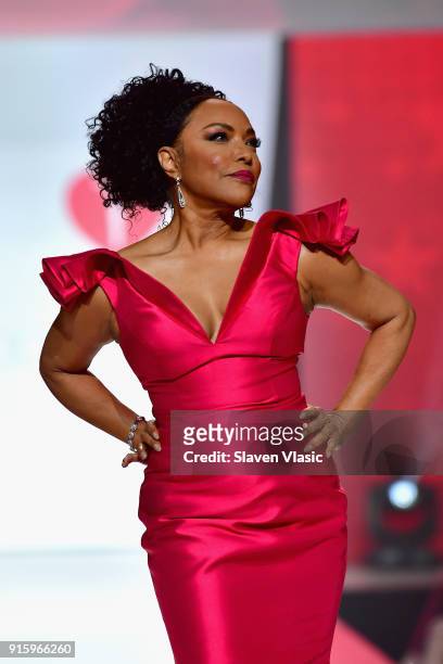 Actor Lynn Whitfield walks the runway during the American Heart Association's Go Red For Women Red Dress Collection 2018 presented by Macy's at...