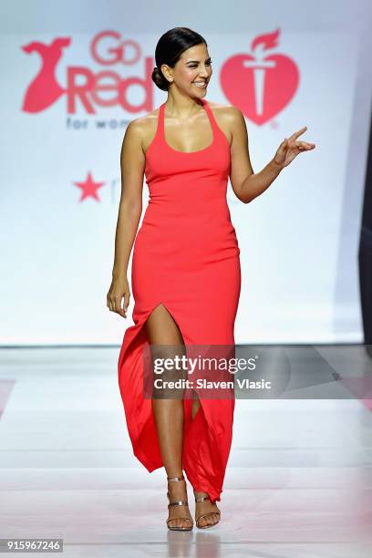 Liz Hernandez walks the runway during the American Heart Association's Go Red For Women Red Dress Collection 2018 presented by Macy's at Hammerstein...