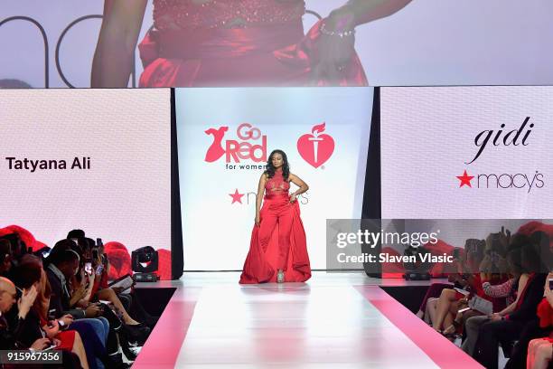 Actor Tatyana Ali walks the runway during the American Heart Association's Go Red For Women Red Dress Collection 2018 presented by Macy's at...