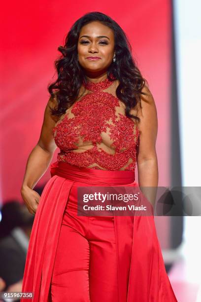 Actor Tatyana Ali walks the runway during the American Heart Association's Go Red For Women Red Dress Collection 2018 presented by Macy's at...