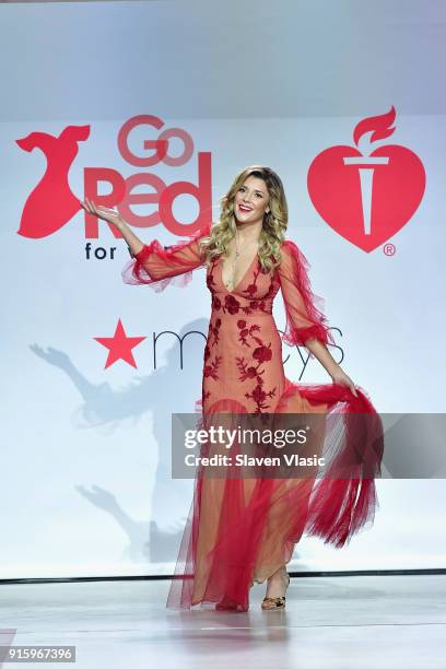 Personality Grace Helbig walks the runway during the American Heart Association's Go Red For Women Red Dress Collection 2018 presented by Macy's at...