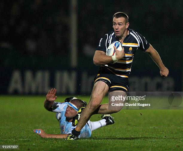 Chris Latham of Worcester moves away from Kevin Kervarec during the Amlin Challenge Cup match between Worcester Warriors and Montpellier at Sixways...