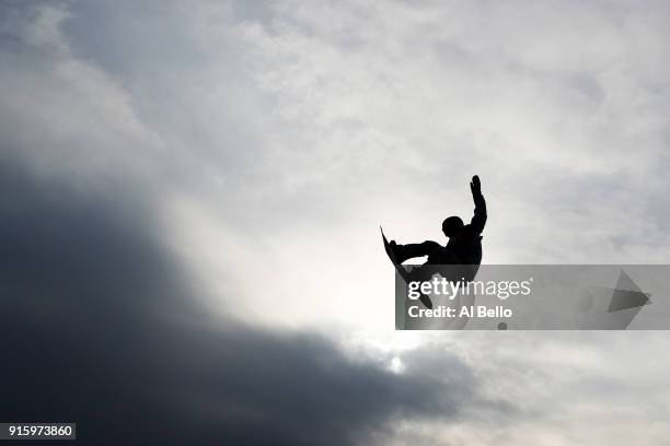 An athlete trains during snowboarding practice ahead of the PyeongChang 2018 Winter Olympic Games at Phoenix Snow Park on February 9, 2018 in...