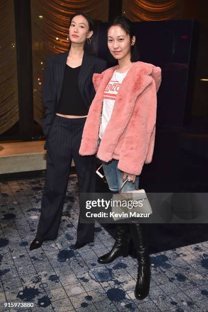 Shu Pei and Anny Fan attend the Stuart Weitzman FW18 Presentation and Cocktail Party at The Pool on February 8, 2018 in New York City.