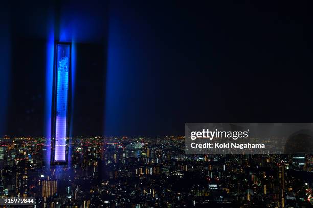 Waterfall by Gil Kuno is displayed at the Media Ambition Tokyo at Roppongi Hills on February 8, 2018 in Tokyo, Japan. gWaterfallh is about the...